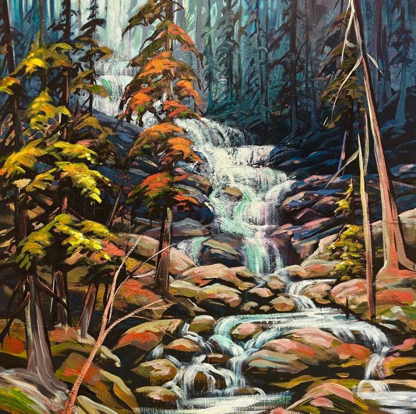 Teresa Grasby painting a winter treescape on canvas in the Grasby Art Studio, NW Calgary
